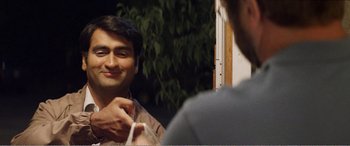 Movie still from “The Kings of Summer” (2013), directed by Jordan Vogt-Roberts – A man looking at himself in the mirror while brushing his teeth; Close Up shot, Over the shoulder angle