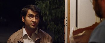 Movie still from “The Kings of Summer” (2013), directed by Jordan Vogt-Roberts – A man standing in front of a mirror; Close Up shot, Over the shoulder angle