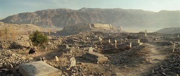 Movie still from “The Kite Runner” (2007), directed by Marc Forster – An old cemetery in the middle of the desert; Extreme Wide shot, High angle