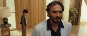 Movie still from “The Kite Runner” (2007), directed by Marc Forster – A person wearing a jacket; Close Up shot, Over the shoulder angle