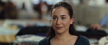 Movie still from “The Kite Runner” (2007), directed by Marc Forster – A person wearing a black shirt; Close Up shot, Over the shoulder angle