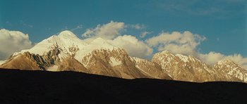 Movie still from “The Kite Runner” (2007), directed by Marc Forster – A view of a mountain range with snow on it; Extreme Wide shot, Low angle