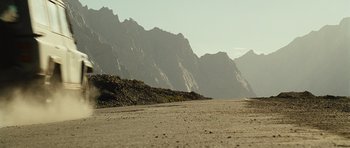 Movie still from “The Kite Runner” (2007), directed by Marc Forster – A view of a mountain range from the beach; Extreme Wide shot, Low angle