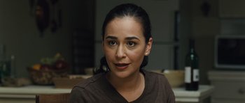 Movie still from “The Kite Runner” (2007), directed by Marc Forster – A person wearing a brown shirt; Close Up shot, High angle