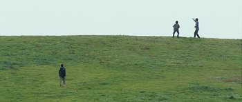 Movie still from “The Kite Runner” (2007), directed by Marc Forster – A green field with a sky in the background; Extreme Wide shot, Low angle