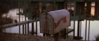Movie still from “The Lake House” (2006), directed by Alejandro Agresti – An old mail box with the u; Extreme Close Up shot, High angle