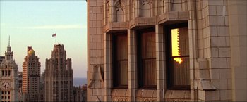 Movie still from “The Lake House” (2006), directed by Alejandro Agresti – A building that has some windows on the side of it; Extreme Wide shot, Low angle
