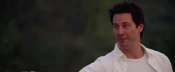 Movie still from “The Lake House” (2006), directed by Alejandro Agresti – A person wearing a white shirt; Close Up shot, Over the shoulder angle