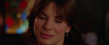 Movie still from “The Lake House” (2006), directed by Alejandro Agresti – A woman's face with her eyes closed; Close Up shot, Over the shoulder angle