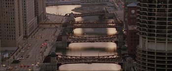 Movie still from “The Lake House” (2006), directed by Alejandro Agresti – An aerial view of a river with several bridges; Extreme Wide shot, High angle