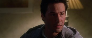 Movie still from “The Lake House” (2006), directed by Alejandro Agresti – A person with short hair; Close Up shot, Over the shoulder angle