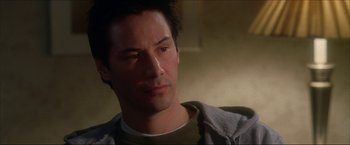 Movie still from “The Lake House” (2006), directed by Alejandro Agresti – A man with a beard is looking at the camera; Close Up shot, Low angle