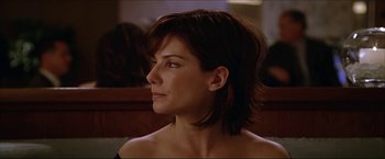 Movie still from “The Lake House” (2006), directed by Alejandro Agresti – A person wearing a black shirt; Close Up shot, Over the shoulder angle