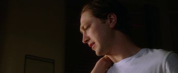 Movie still from “The Lake House” (2006), directed by Alejandro Agresti – A person with his head turned to the side; Close Up shot, Low angle