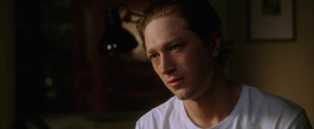Movie still from “The Lake House” (2006), directed by Alejandro Agresti – A person wearing a white t - shirt; Close Up shot, Over the shoulder angle
