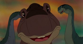 Movie still from “The Land Before Time” (1988), directed by Don Bluth – A hippo's face in a painting; Close Up shot, Low angle