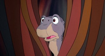 Movie still from “The Land Before Time” (1988), directed by Don Bluth – The head of a hippopotamus; Close Up shot, Low angle