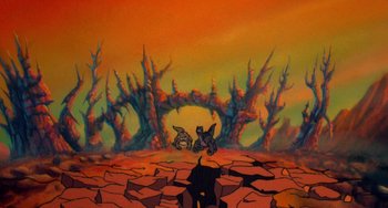 Movie still from “The Land Before Time” (1988), directed by Don Bluth – A painting of a barren landscape with trees and rocks; Extreme Wide shot, High angle