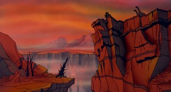 Movie still from “The Land Before Time” (1988), directed by Don Bluth – A painting of a dragon on top of a cliff; Extreme Wide shot, Low angle