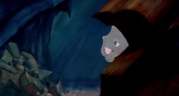 Movie still from “The Land Before Time” (1988), directed by Don Bluth – An elephant is looking out of a window; Medium shot, High angle