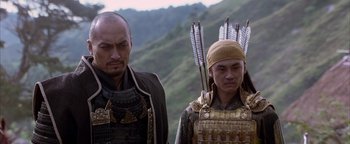 Movie still from “The Last Samurai” (2003), directed by Edward Zwick – Two men are dressed up with arrows on their heads; Close Up shot, Over the shoulder angle