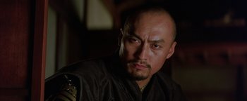 Movie still from “The Last Samurai” (2003), directed by Edward Zwick – A person wearing a jacket; Close Up shot, Low angle