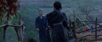 Movie still from “The Last Samurai” (2003), directed by Edward Zwick – A group of people standing on top of a hill; Medium shot, Over the shoulder angle