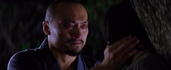Movie still from “The Last Samurai” (2003), directed by Edward Zwick – A man is crying while looking into a mirror; Close Up shot, Over the shoulder angle
