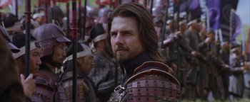 Movie still from “The Last Samurai” (2003), directed by Edward Zwick – A person with a beard wearing armor; Close Up shot, Over the shoulder angle