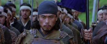 Movie still from “The Last Samurai” (2003), directed by Edward Zwick – A person wearing a helmet; Close Up shot, Low angle