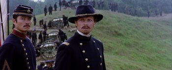 Movie still from “The Last Samurai” (2003), directed by Edward Zwick – A man in a military uniform standing in front of a crowd; Close Up shot, Low angle