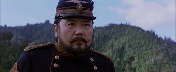 Movie still from “The Last Samurai” (2003), directed by Edward Zwick – A person wearing a military uniform; Close Up shot, Low angle