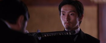 Movie still from “The Last Samurai” (2003), directed by Edward Zwick – A person holding a sword; Close Up shot, Low angle