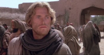 Movie still from “The Last Temptation of Christ” (1988), directed by Martin Scorsese – A person wearing a scarf; Close Up shot, Low angle