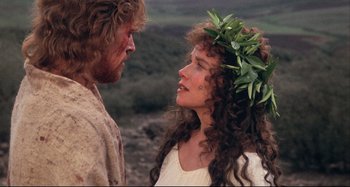 Movie still from “The Last Temptation of Christ” (1988), directed by Martin Scorsese – A man and a woman standing next to each other; Close Up shot, Over the shoulder angle