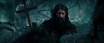 Movie still from “The Last Witch Hunter” (2015), directed by Breck Eisner – A man with long hair and a long beard; Close Up shot, Over the shoulder angle
