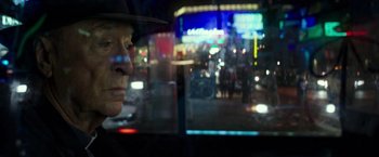Movie still from “The Last Witch Hunter” (2015), directed by Breck Eisner – A man wearing a hat looking out of a car window at night; Close Up shot, Over the shoulder angle