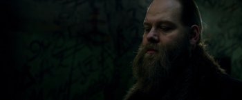 Movie still from “The Last Witch Hunter” (2015), directed by Breck Eisner – A man with a long beard is looking down; Close Up shot, Low angle
