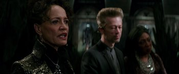 Movie still from “The Last Witch Hunter” (2015), directed by Breck Eisner – A woman and a man standing next to each other in a room; Close Up shot, Over the shoulder angle