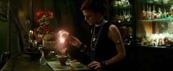Movie still from “The Last Witch Hunter” (2015), directed by Breck Eisner – A woman holding a sparkler in her hand; Medium shot, Low angle