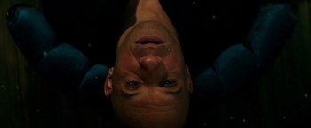 Movie still from “The Last Witch Hunter” (2015), directed by Breck Eisner – A person upside down with their eyes closed; Close Up shot, Overhead angle