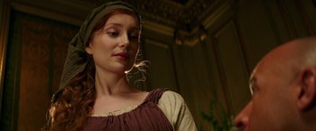 Movie still from “The Last Witch Hunter” (2015), directed by Breck Eisner – A woman in a medieval dress looking to her left; Close Up shot, Low angle