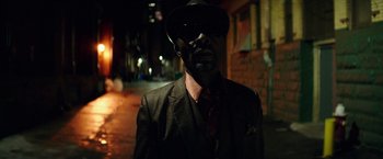 Movie still from “The Last Witch Hunter” (2015), directed by Breck Eisner – A man wearing a suit and a hat is standing in the dark; Close Up shot, Low angle