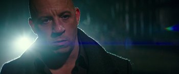 Movie still from “The Last Witch Hunter” (2015), directed by Breck Eisner – Vin diesel's face in a dark room; Close Up shot, Over the shoulder angle