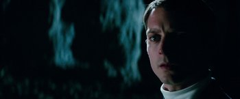 Movie still from “The Last Witch Hunter” (2015), directed by Breck Eisner – A person wearing a white shirt; Close Up shot, Low angle