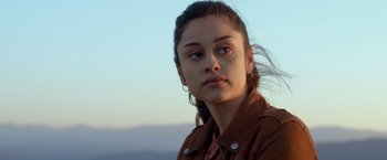 Movie still from “Rambo: Last Blood” (2019), directed by Adrian Grunberg – A person wearing a brown jacket; Close Up shot, Low angle