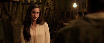 Movie still from “Rambo: Last Blood” (2019), directed by Adrian Grunberg – A young woman standing in front of a mirror; Medium shot, Over the shoulder angle