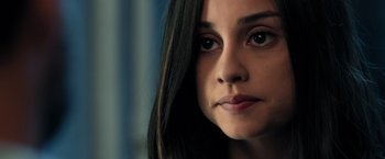 Movie still from “Rambo: Last Blood” (2019), directed by Adrian Grunberg – A person with long hair; Close Up shot, Over the shoulder angle