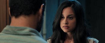 Movie still from “Rambo: Last Blood” (2019), directed by Adrian Grunberg – A young woman looking into a mirror with a man standing next to her; Close Up shot, Over the shoulder angle