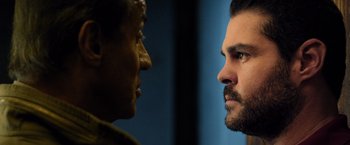 Movie still from “Rambo: Last Blood” (2019), directed by Adrian Grunberg – A man and a woman face to face in front of each other; Close Up shot, Over the shoulder angle